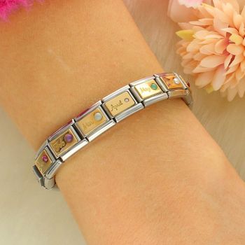 Nomination Link 18K Marzec Akwamaryn 03051903  Zawieszka Composable (1).jpg